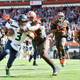 Image for article titled Russell Wilson Doesn't Need A Damn Headset